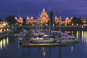 BC Legislature seen from across the docks in front of the Empress Hotel