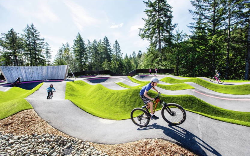 kid riding bike at Jordie Lunn