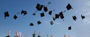 throwing graduation caps in the air
