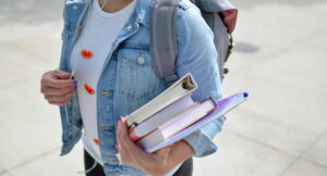 student carrying books